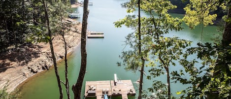 View from Master Bedroom looking down at the dock and main channel of the lake