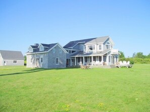 The Stone House, with water views from every room, looking from shore
