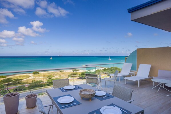 Balcony w/ table and chairs