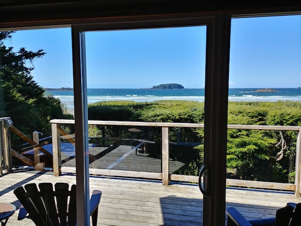 View from Living room, hot tub and beach