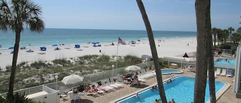 View of the pool, hot tub and beach