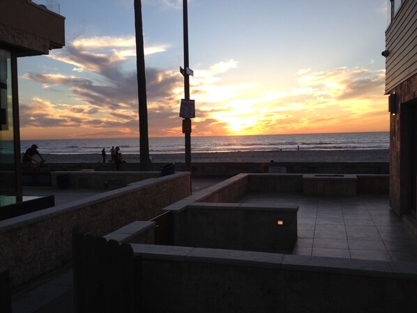 Beautiful views of sunsets, sand and surf from spacious deck