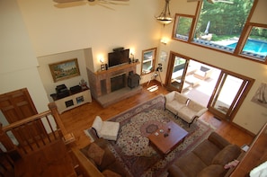 First Floor Living Room with 2 story high ceilings & large south facing window