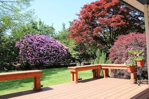 Get outside! Back deck overlooking the backyard and blooming landscape.