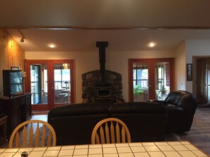 Living area and sunroom from kitchen
