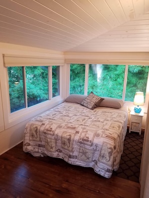 Bedroom with queen bed & view of Bamboo 
