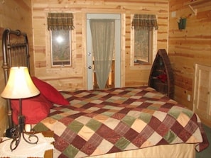 Lofted Bedroom with full bath!  Enjoy coffee outside on this charming deck!