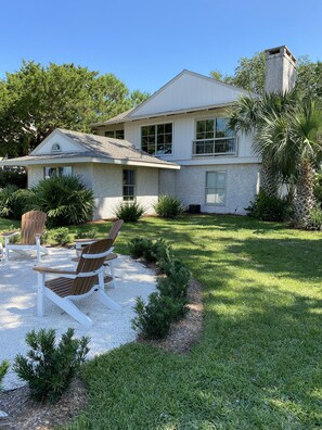 Sea Island Forge Firepit with 6 Adirondack chairs overlooking marsh sunsets!  