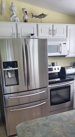 Stainless steel refrigerator with lots of room 