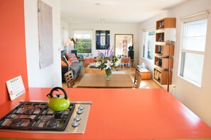 Mid century modern kitchen with pops of bright color