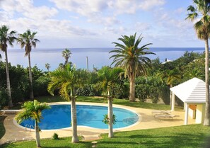 Pool and pool bar area, waters of the southshore in the back ground.