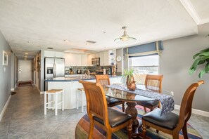 Kitchen dining area, seats 4 at bar and 4 at table