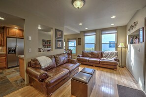 Comfortable Deep Italian Leather Couches and Original Hardwood Floors