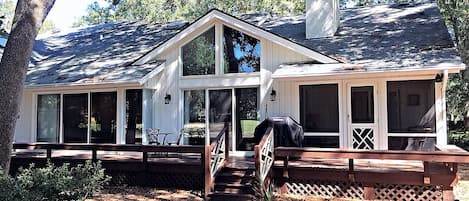 Large deck and screen porch facing golf course.