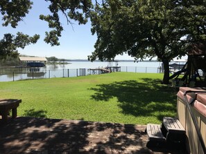 Large back yard with fence.