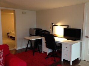 Office/Study with a new HP wireless printer and 32" Flat screen TV