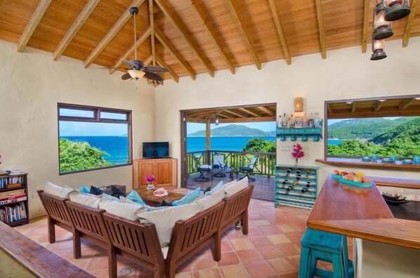 Lounge about with patio doors open and views of the surrounding islands