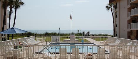 Standing on the patio overlooking the pool and Atlantic Ocean