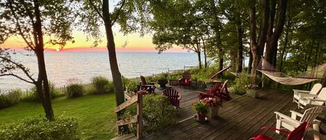 Backyard overlooking Lake Michigan with extra large deck and fire pit.