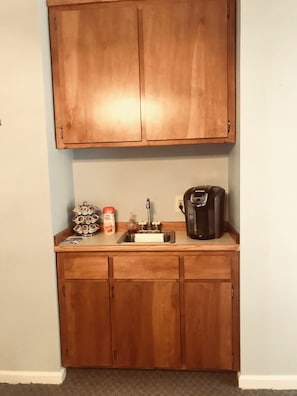 Coffee and sink station, dishes and toaster