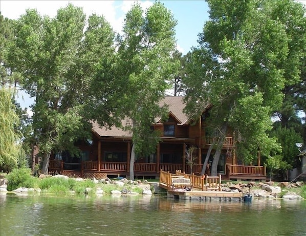 Rainbow Lake cabin with large covered porch and breath-taking views