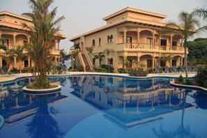Walk down from the front door to cool off in a beautiful pool and jacuzzi