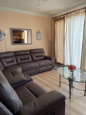 den with new couch and new flooring 10/22