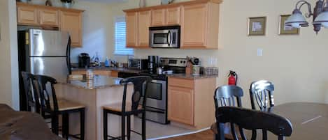 Beautiful upgraded and fully stocked kitchen.