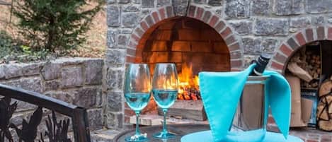 Enjoy a beverage while viewing our warm, cozy fireplace