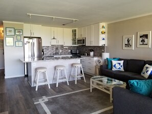 New Chef's Kitchen with granite counter-tops and stainless steel appliances. 