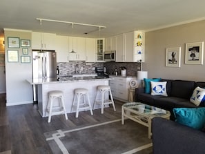 New Chef's Kitchen with granite counter-tops and stainless steel appliances. 