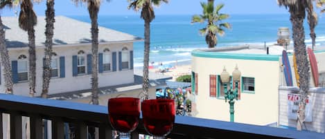 Relax with a drink, coffee above the Pacific Ocean and Boardwalk below