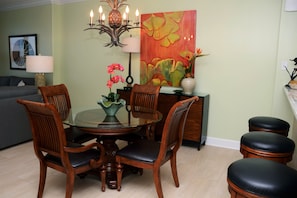 The dining area has seating for four at the table.