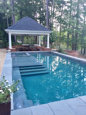 Back pool with outdoor kitchen