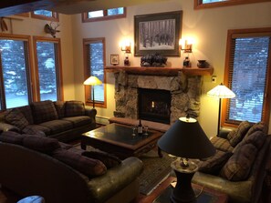 Gather around our cozy fireplace on a snowy day!