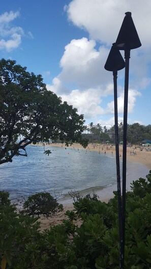 This beach is just an 8 min walk from the condo, or just drive, there is parking