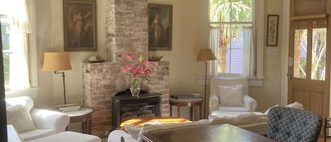 Living room with side entrance and gas fireplace