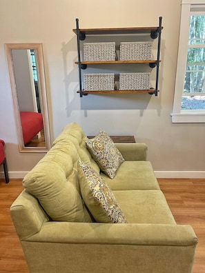 Love seat and clothing storage