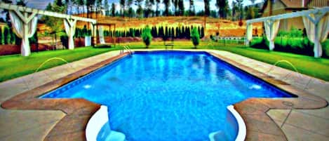 Saltwater pool, beautifully landscaped yard