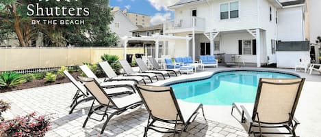 Shutters By The Beach has a large private pool and plenty of outdoor seating