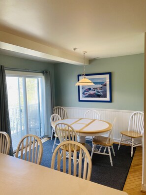 Breakfast nook with sliders to front deck