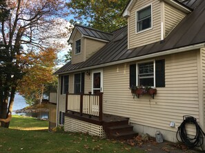 House front, lakeside to left. 