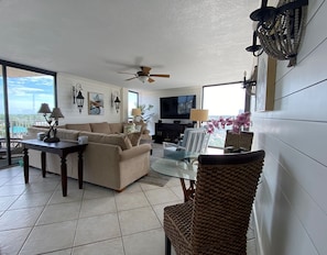 Another view of Spacious Living Room and doors to Bay View Balcony