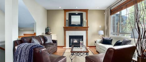 luxurious living room with gas fireplace