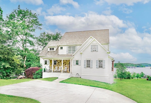 Beautiful home on a deep water, point lot.
Views from every room and gentle lot