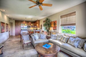 Comfy seating area in living room, views and entertainment