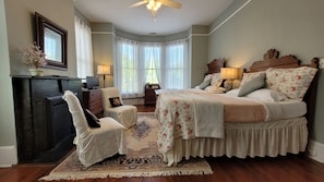 Two full-size beds with cotton sheets, plush pillows, & memory foam mattresses