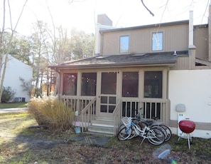 Large screened-in porch adds to the living space. Bikes and grill provided!