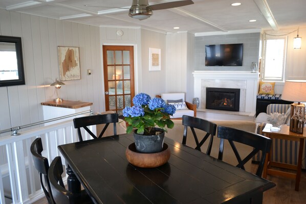 Great open dining and living room area with seats for every guest.