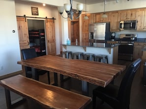 Large kitchen table that sits 8 easily. Also 4 bar stools at the large island